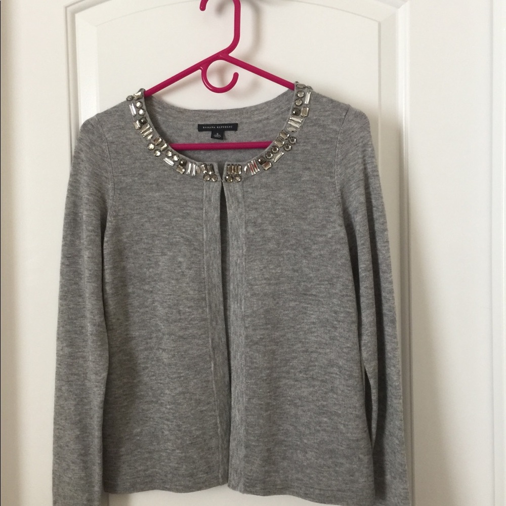 Add a touch of glam in this bejeweled cardigan!